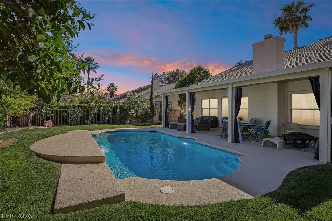 5236 Saranac Road Las Vegas, NV 89130 - Photo 49 of 52 This private outdoor space features a refreshing pool and a covered patio for ultimate relaxation.