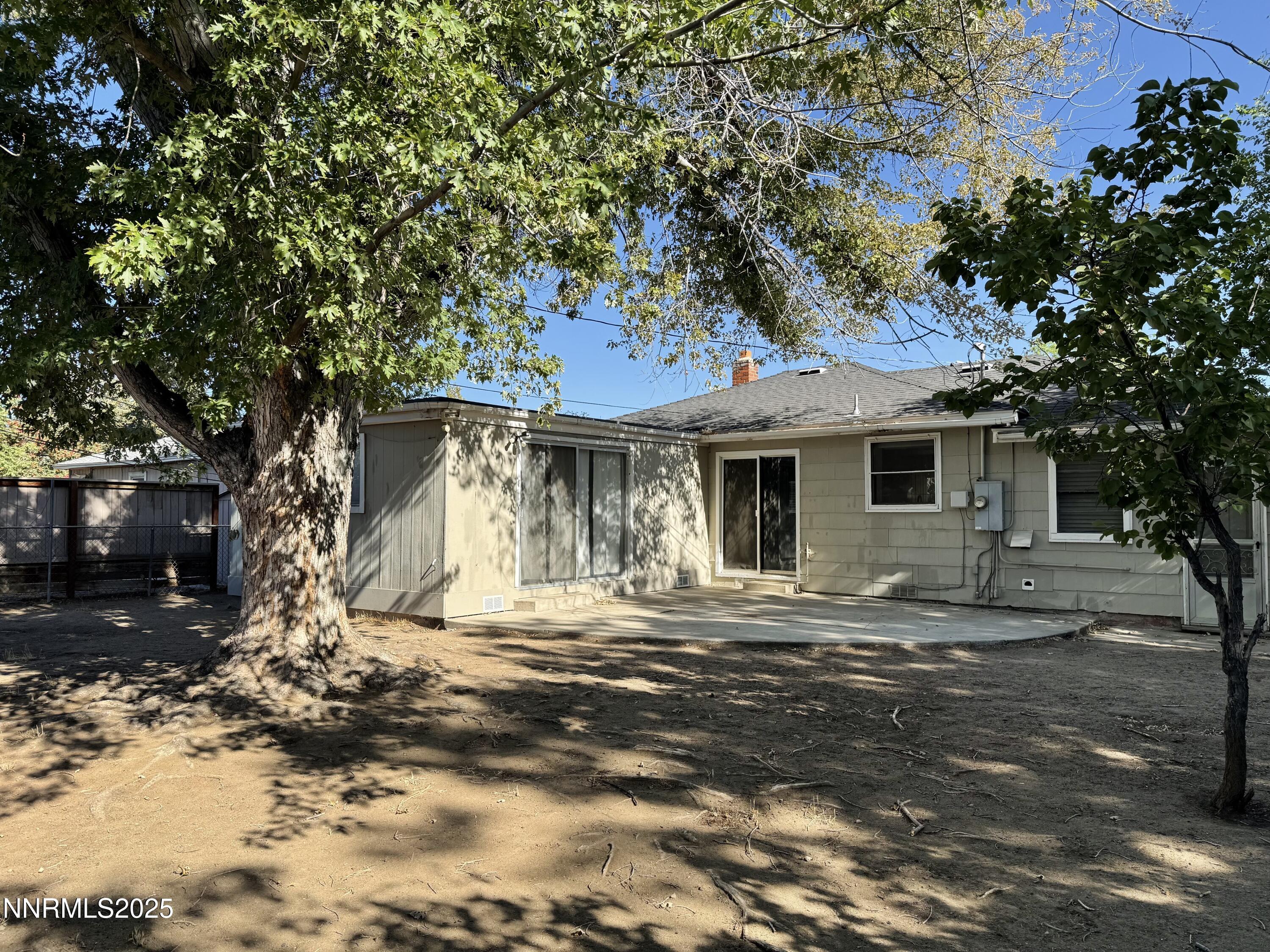 345 H Street Sparks, NV 89431 - Photo 3 of 14 a front view of a house with a yard