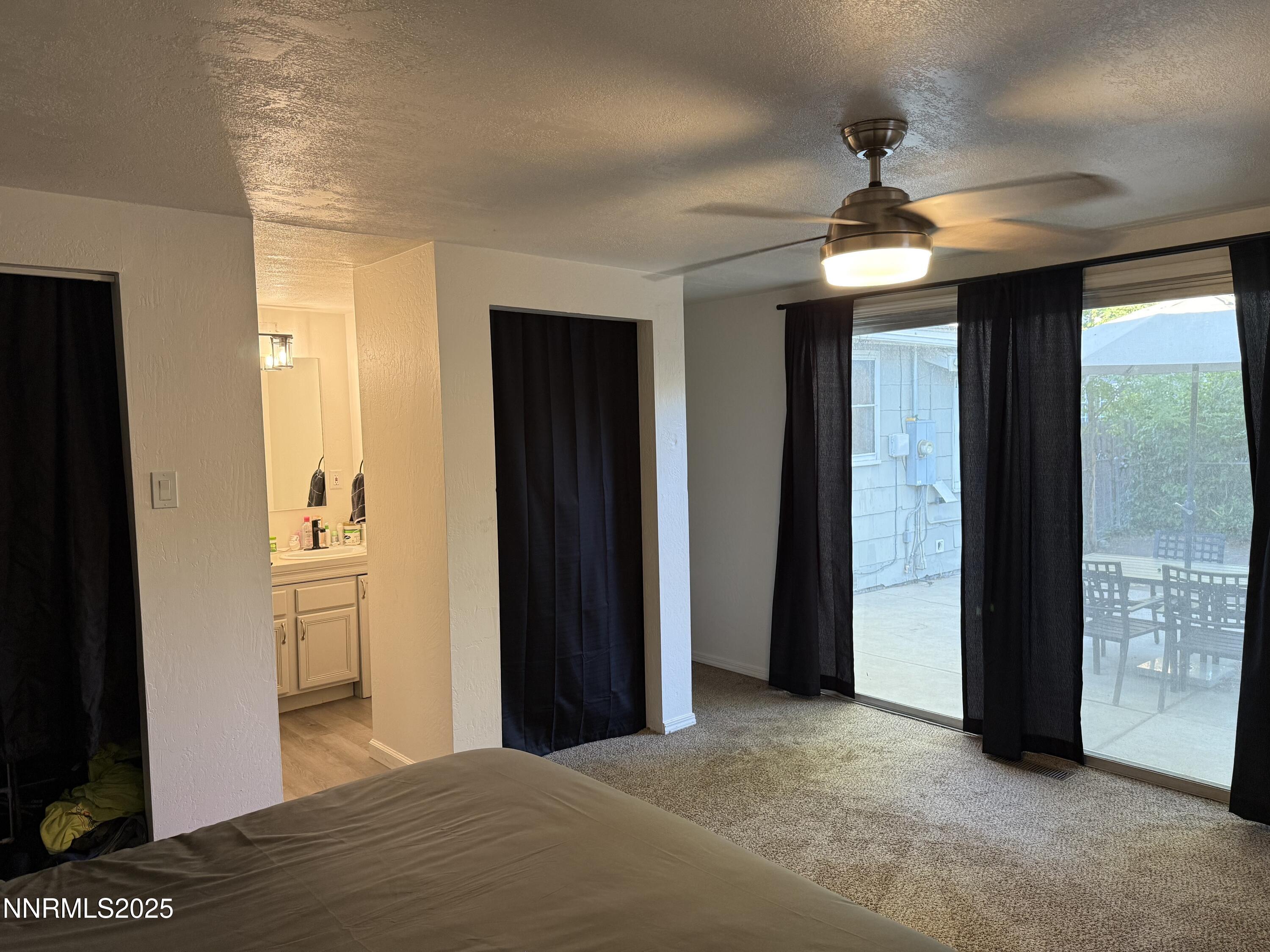345 H Street Sparks, NV 89431 - Photo 8 of 14 a view of a hallway with a chandelier