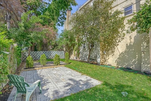 a view of backyard with tree
