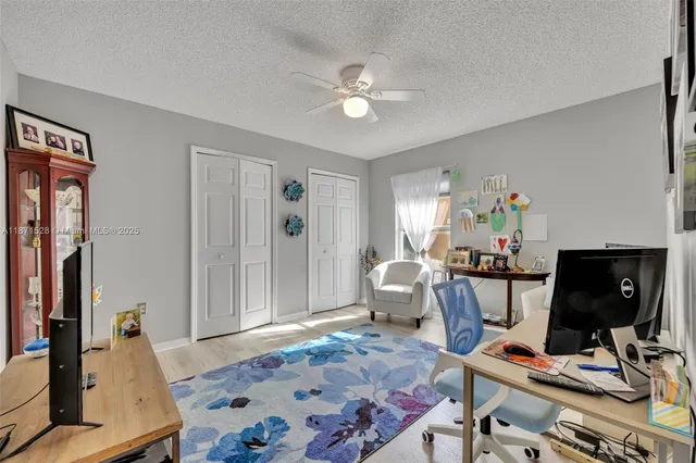 a workspace with furniture and window