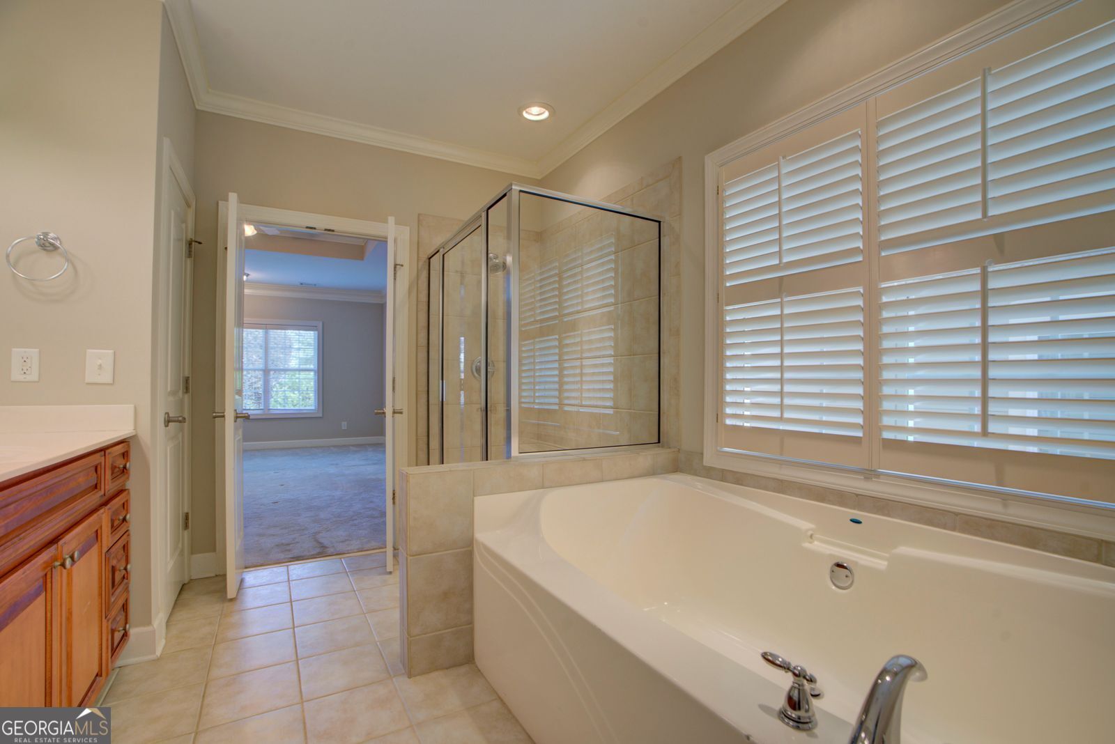115 Carriage Way Southeast Rome, GA 30161 - Photo 23 of 39 a bathroom with a bathtub and a shower