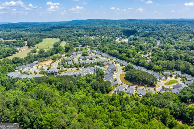 a view of swimming pool with an outdoor space and seating area