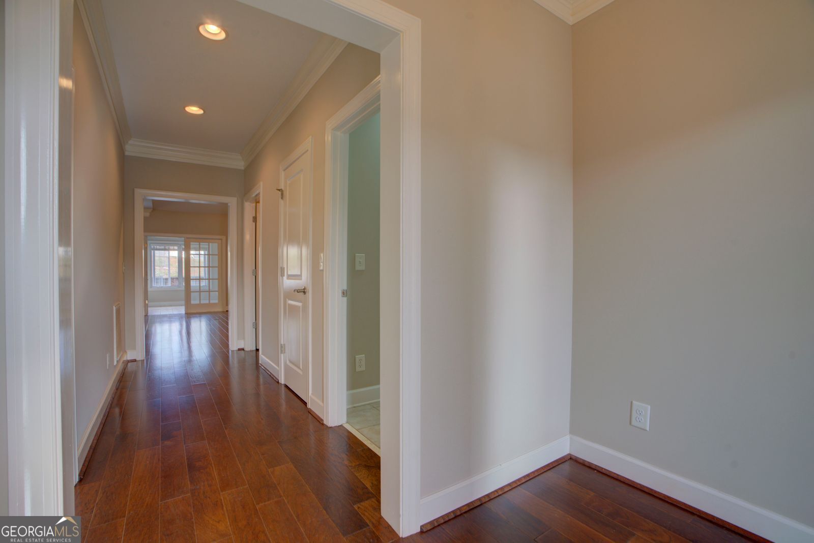 115 Carriage Way Southeast Rome, GA 30161 - Photo 7 of 39 a view of a hallway with wooden floor