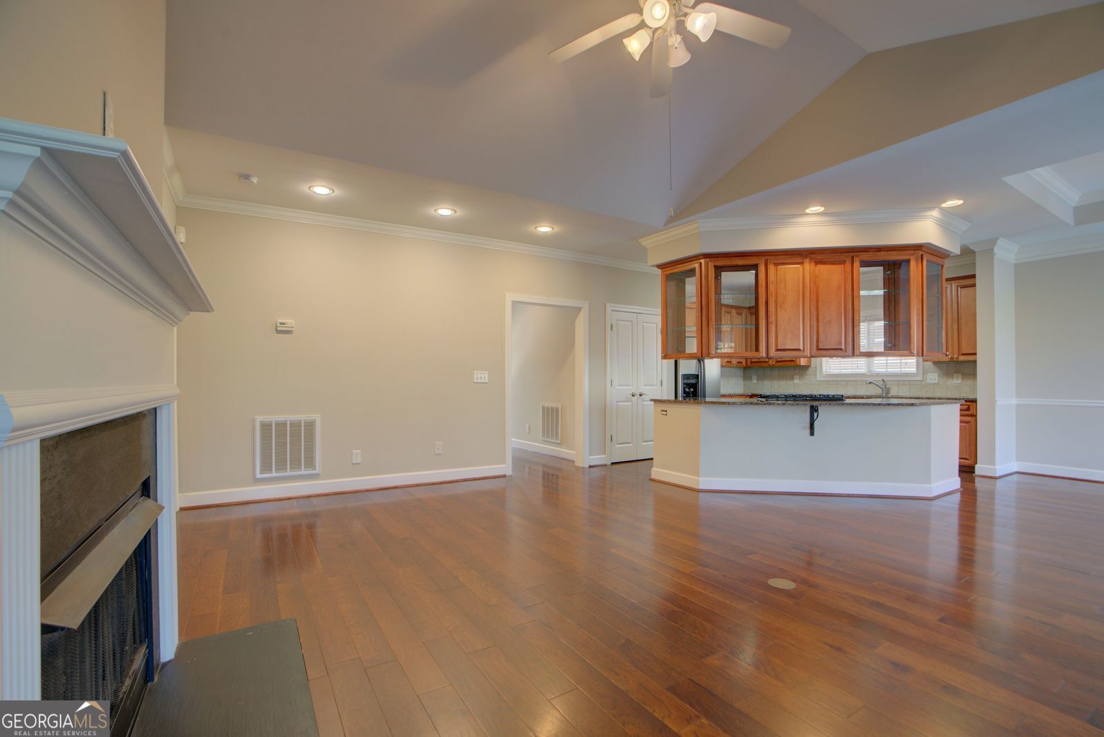 115 Carriage Way Southeast Rome, GA 30161 - Photo 9 of 39 a view of kitchen with kitchen island wooden floor and electronic appliances