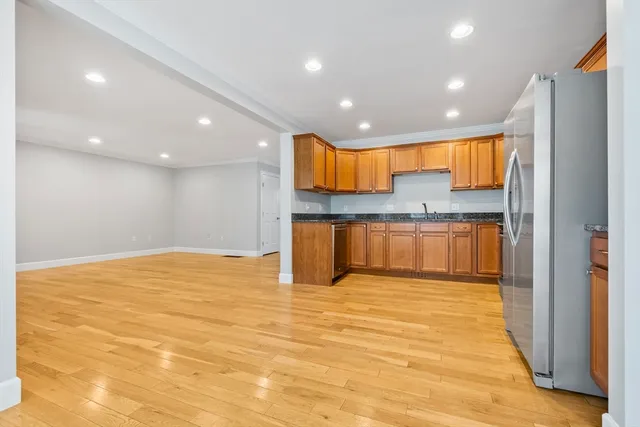 a view of kitchen view with wooden floor