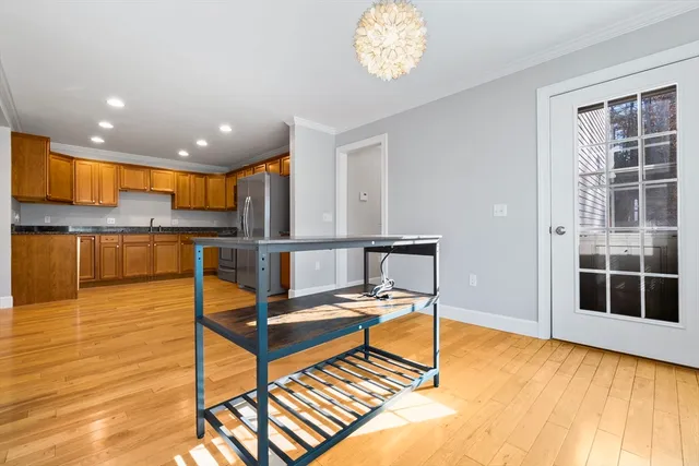 a living room with furniture pool and a table