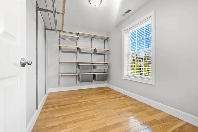 a view of a room with a staircase and a rug