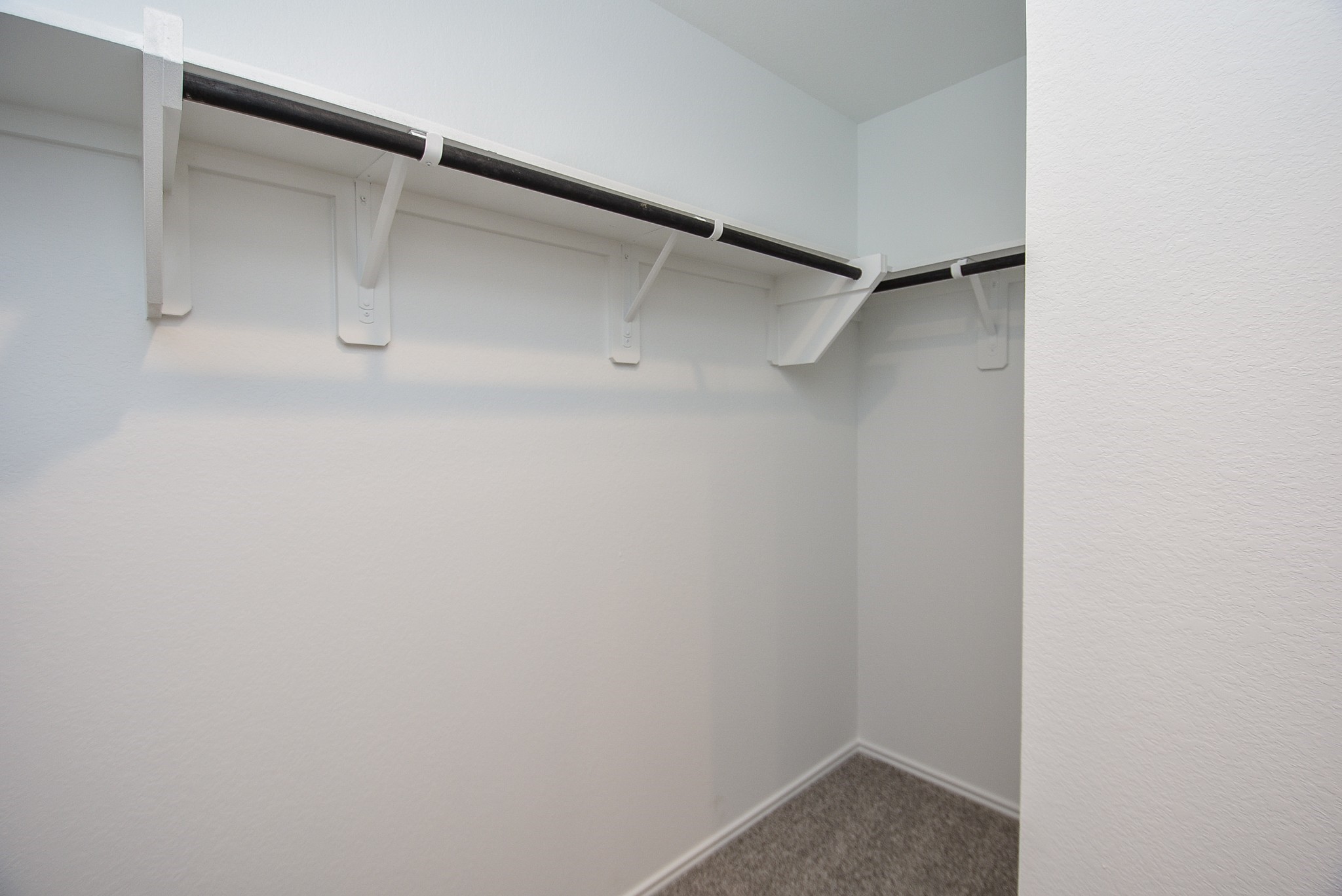 5735 Sycamore Glen Dr Spring Spring, TX 77373 - Photo 14 of 26 a view of an empty walk in closet