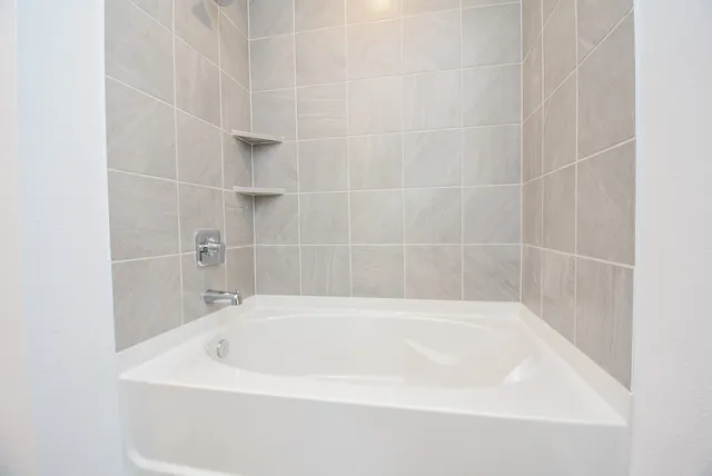 a bathroom with a bathtub