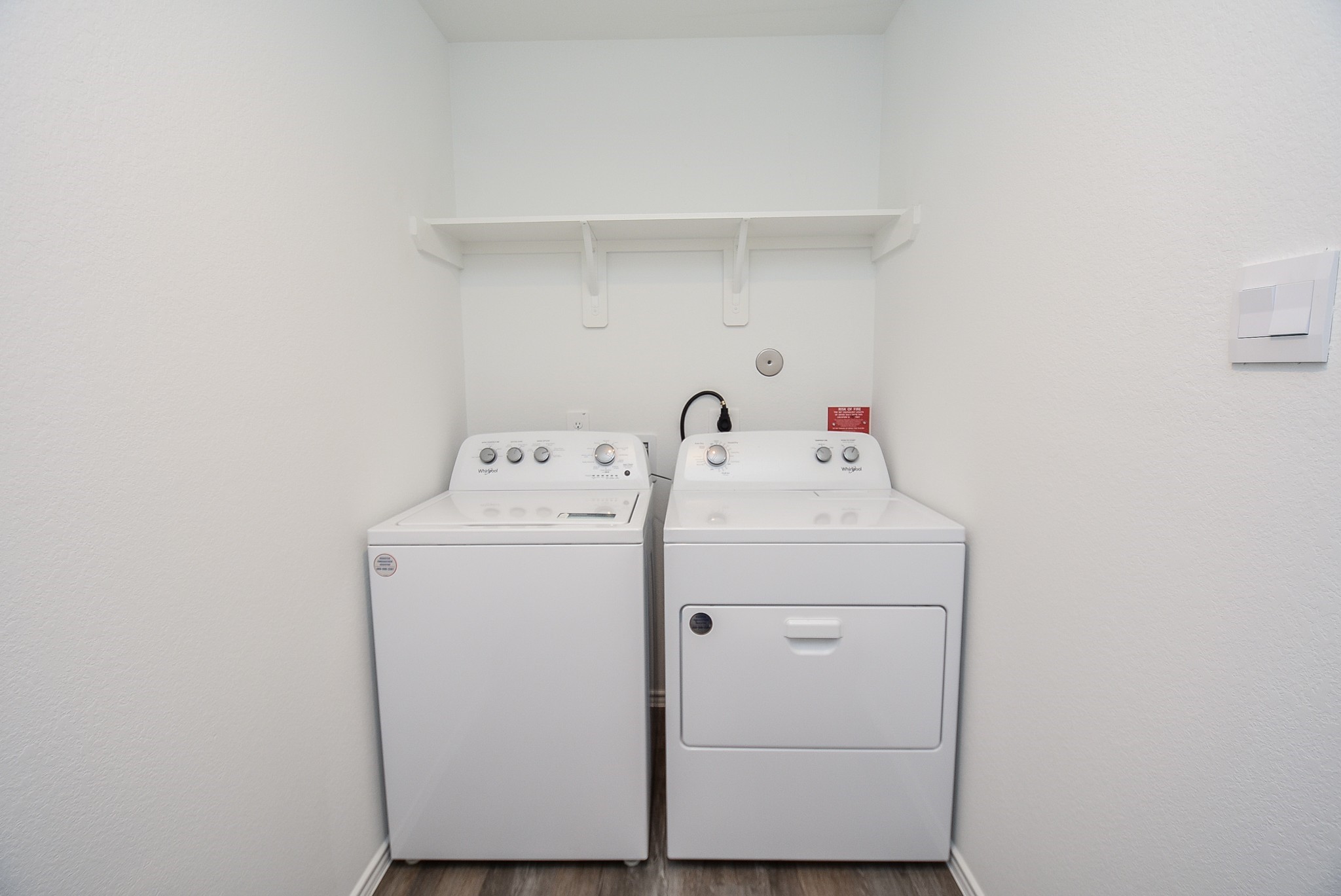 5735 Sycamore Glen Dr Spring Spring, TX 77373 - Photo 22 of 26 a utility room with dryer and washer