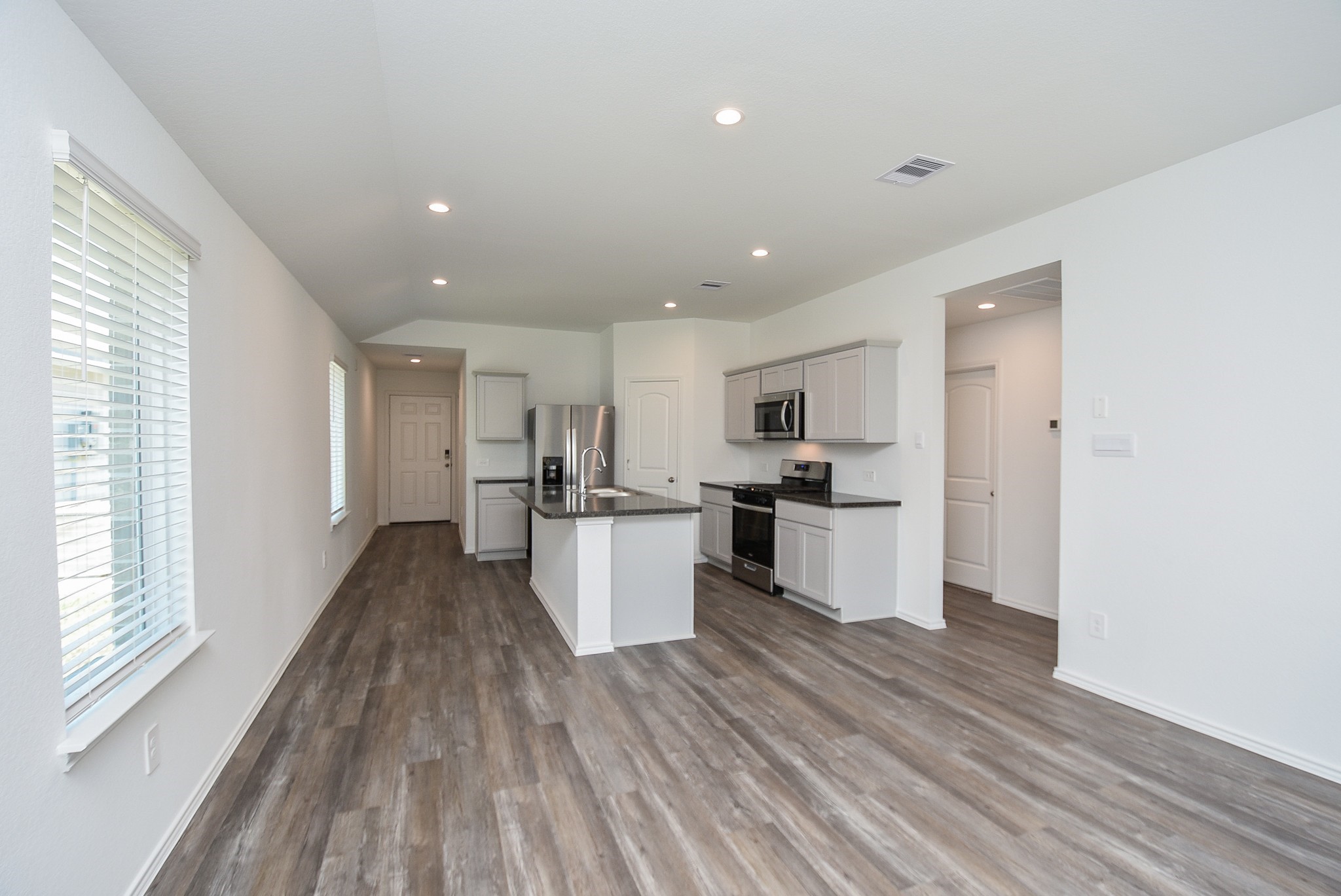 5735 Sycamore Glen Dr Spring Spring, TX 77373 - Photo 9 of 26 a view of kitchen with wooden floor