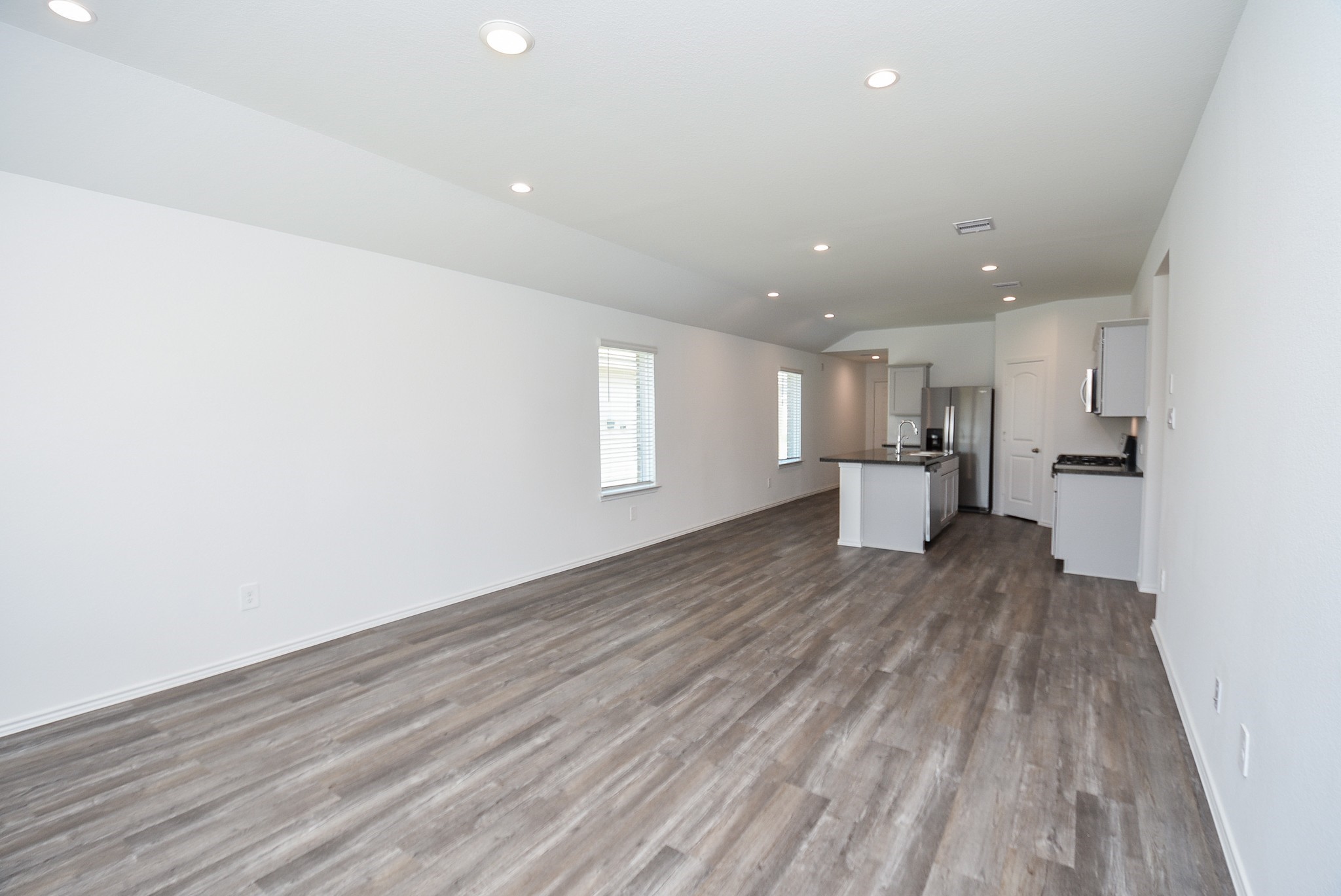 5735 Sycamore Glen Dr Spring Spring, TX 77373 - Photo 10 of 26 a view of empty room with wooden floor