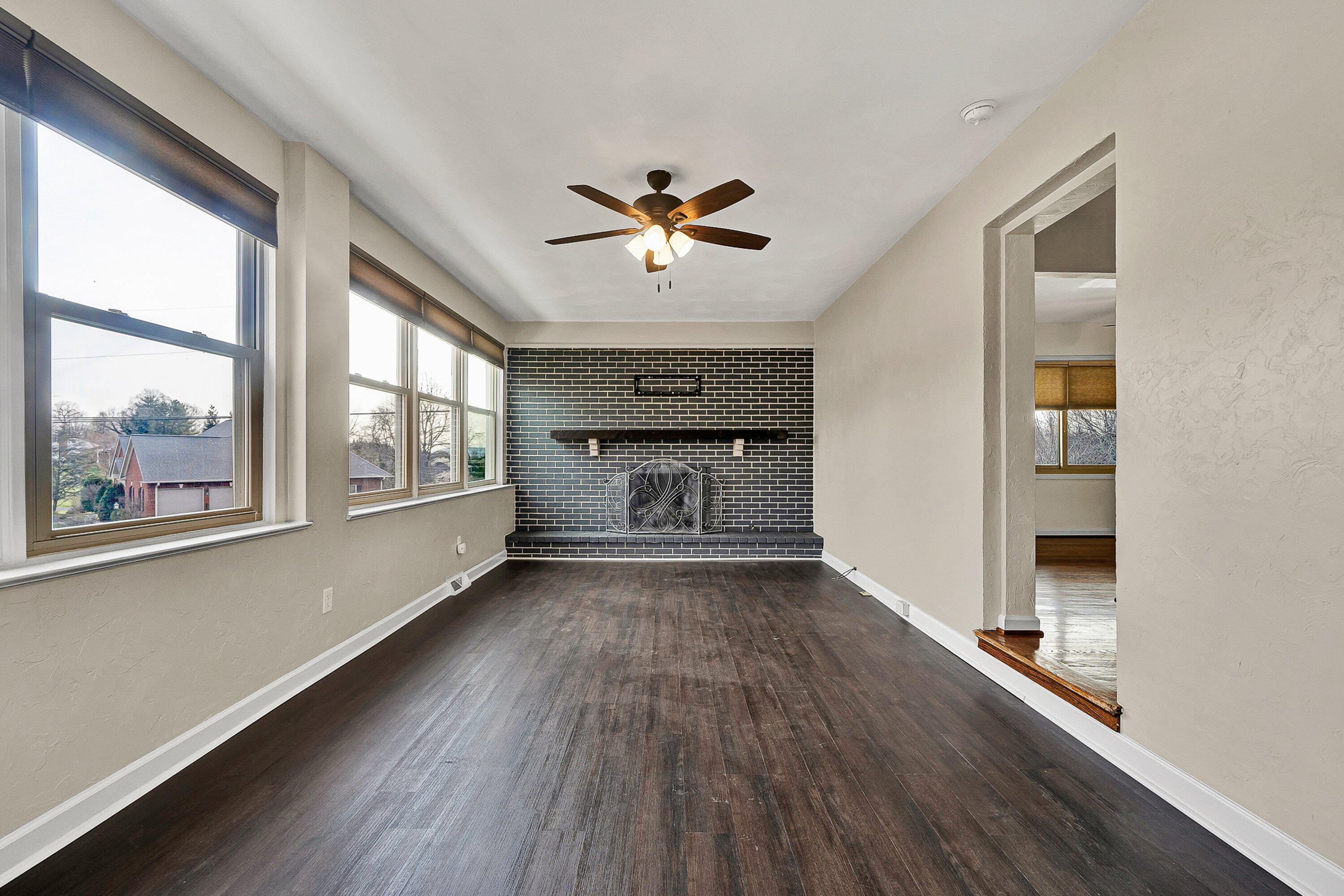 405 Diamond Road Salem, VA 24153 - Photo 10 of 28 wooden floor in an empty room with a window