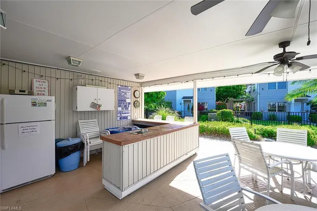 a view of a patio with a yard