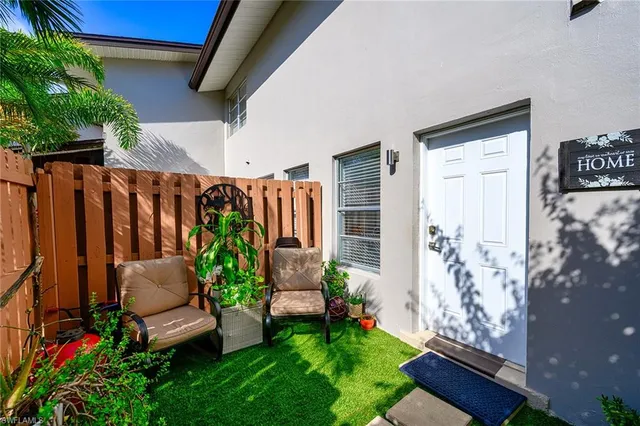a garden view with a seating space