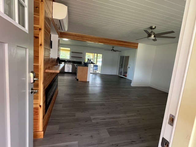 3880 Aka Road Koloa, HI 96756 - Photo 11 of 29 a view of a hallway view with wooden floor and staircase