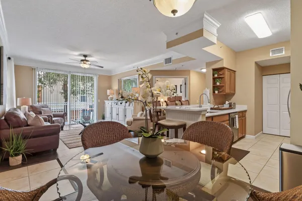 a view of a dining room with furniture and wooden floor