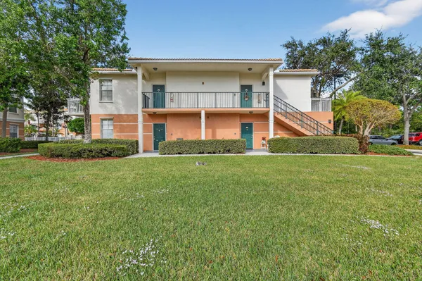 a view of house with yard