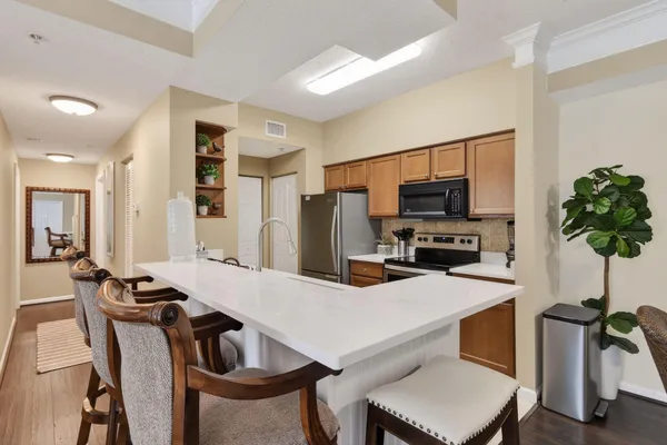a view of a dining room with furniture