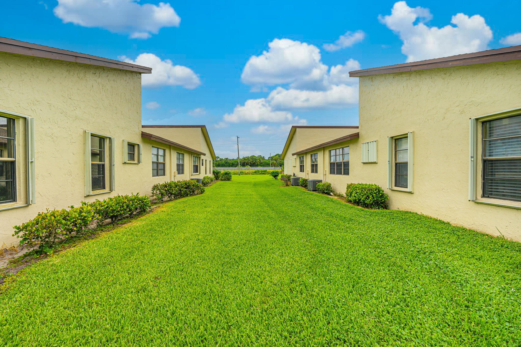 13953 Nesting Way, Unit D Delray Beach, FL 33484 - Photo 6 of 44 Side of the House