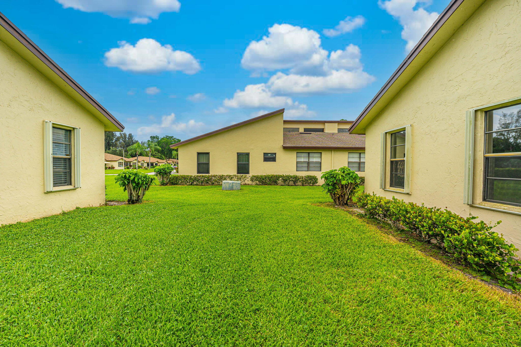 13953 Nesting Way, Unit D Delray Beach, FL 33484 - Photo 8 of 44 Side of the House