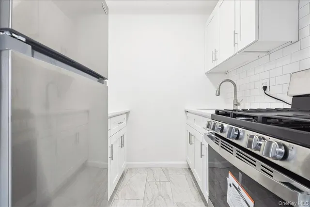 a view of cabinets with sink