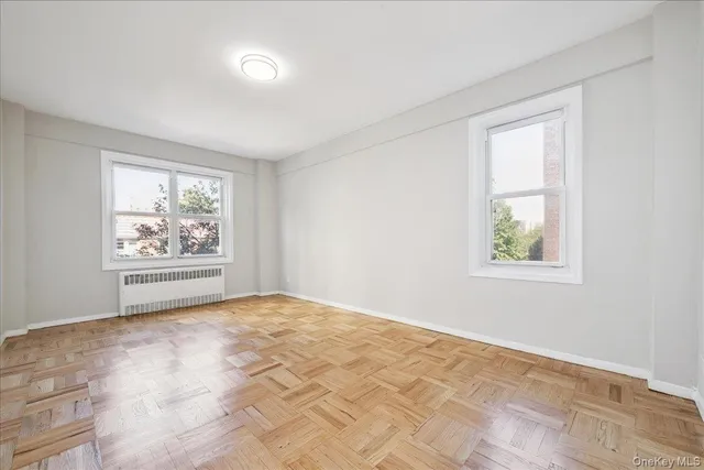 a view of an empty room and window