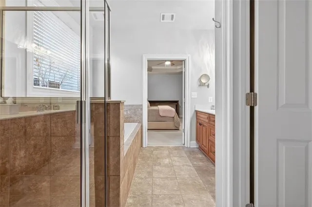 a view of a hallway with a living room space