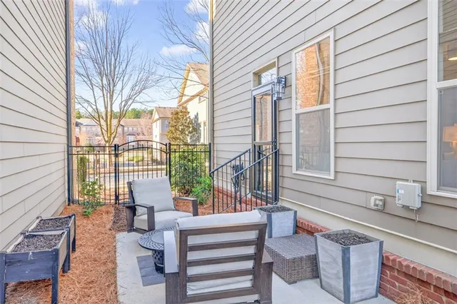 a view of house with outdoor seating