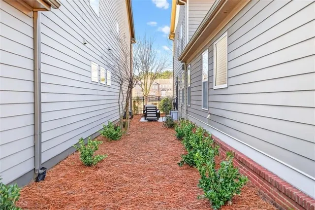 a view of a pathway with a house