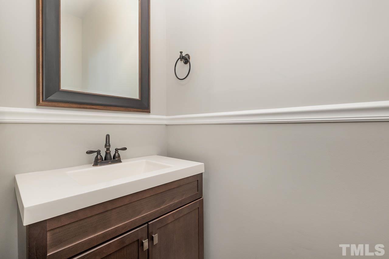4311 Sugarbend Way Raleigh, NC 27606 - Photo 9 of 26 Half bath on first floor for entertaining