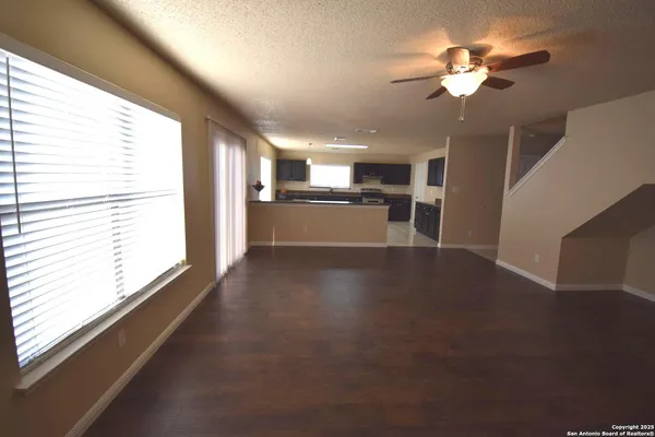 a kitchen with a stove a sink and a refrigerator