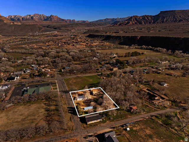 83 West 100 South Virgin, UT 84779 - Photo 29 of 35 Overview of rural landscape with a mountain backdrop and property parcel outlined