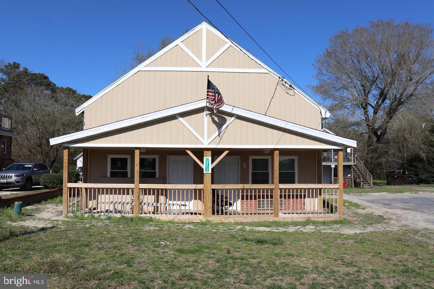 28650 Old Quantico Road Salisbury, MD 21801 - Photo 4 of 7 a view of front of house with large windows