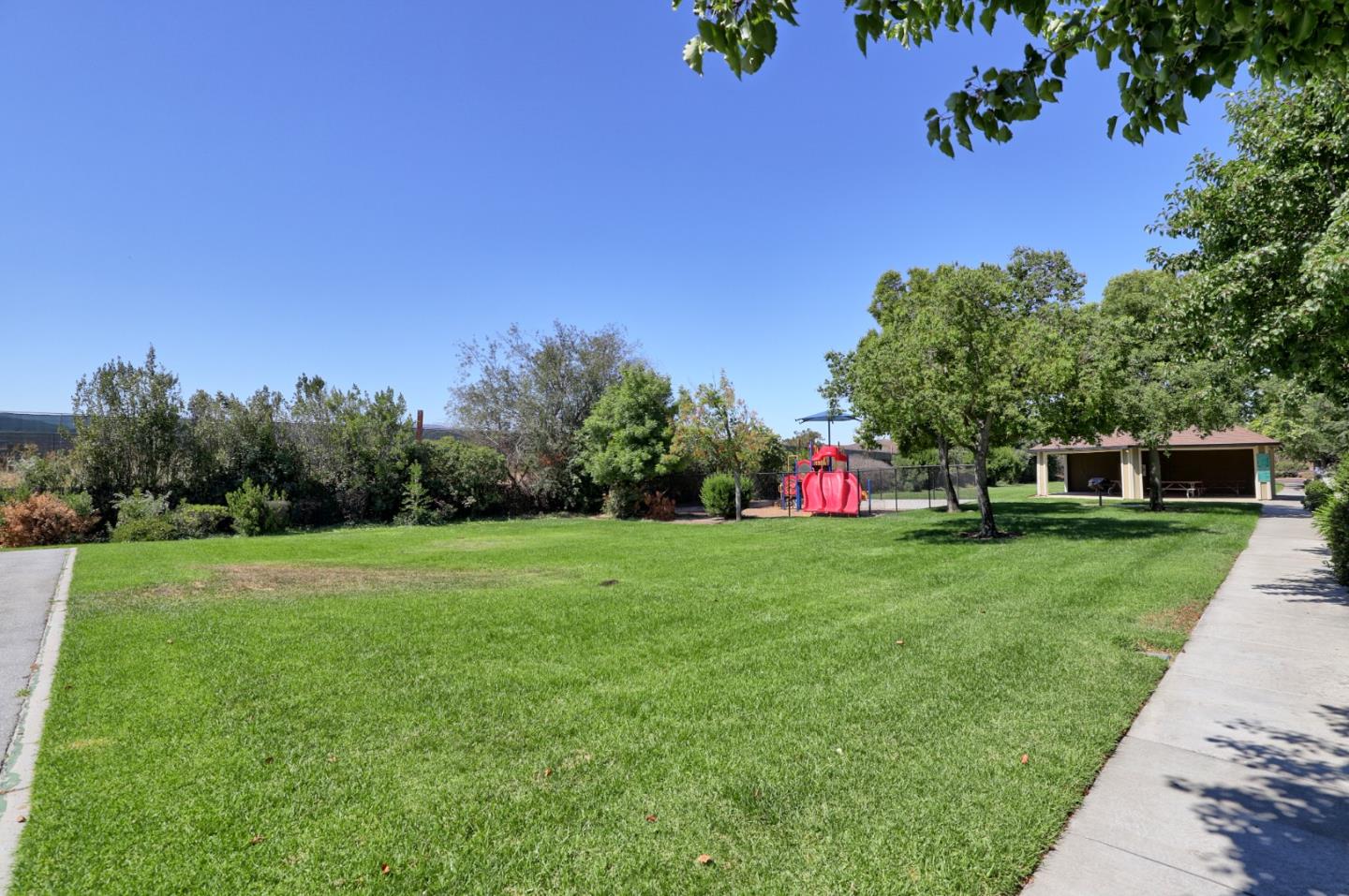 801 Nash Road, Unit I2 Hollister, CA 95023 - Photo 26 of 26 a green field with lots of trees in it