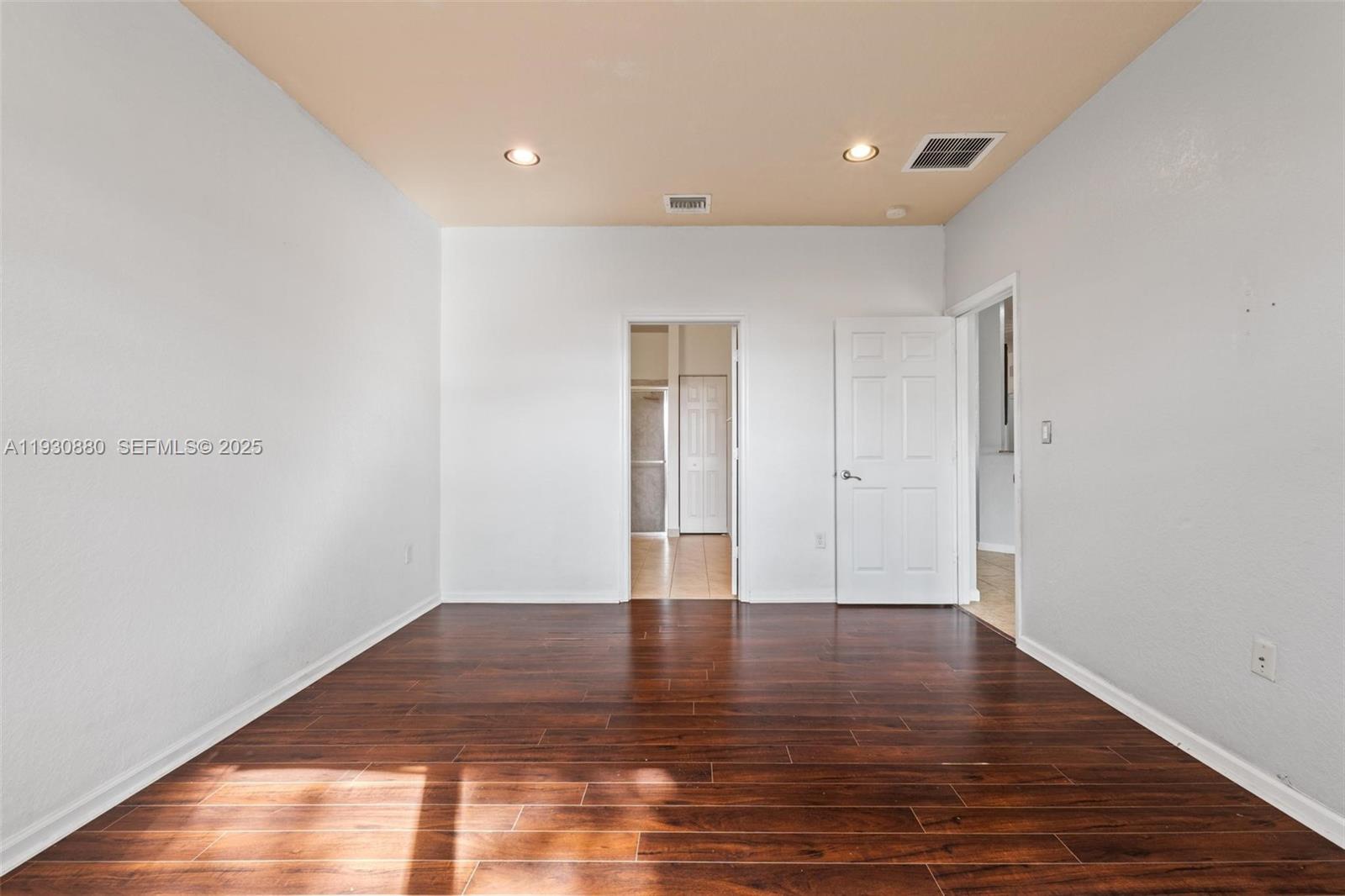 3448 Northeast 1st Street, Unit 3448 Homestead, FL 33033 - Photo 11 of 19 a view of empty room with wooden floor