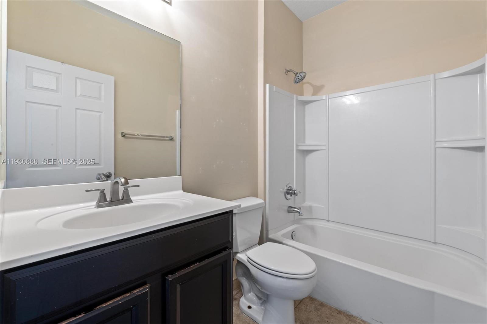3448 Northeast 1st Street, Unit 3448 Homestead, FL 33033 - Photo 14 of 19 a bathroom with a sink a toilet and shower