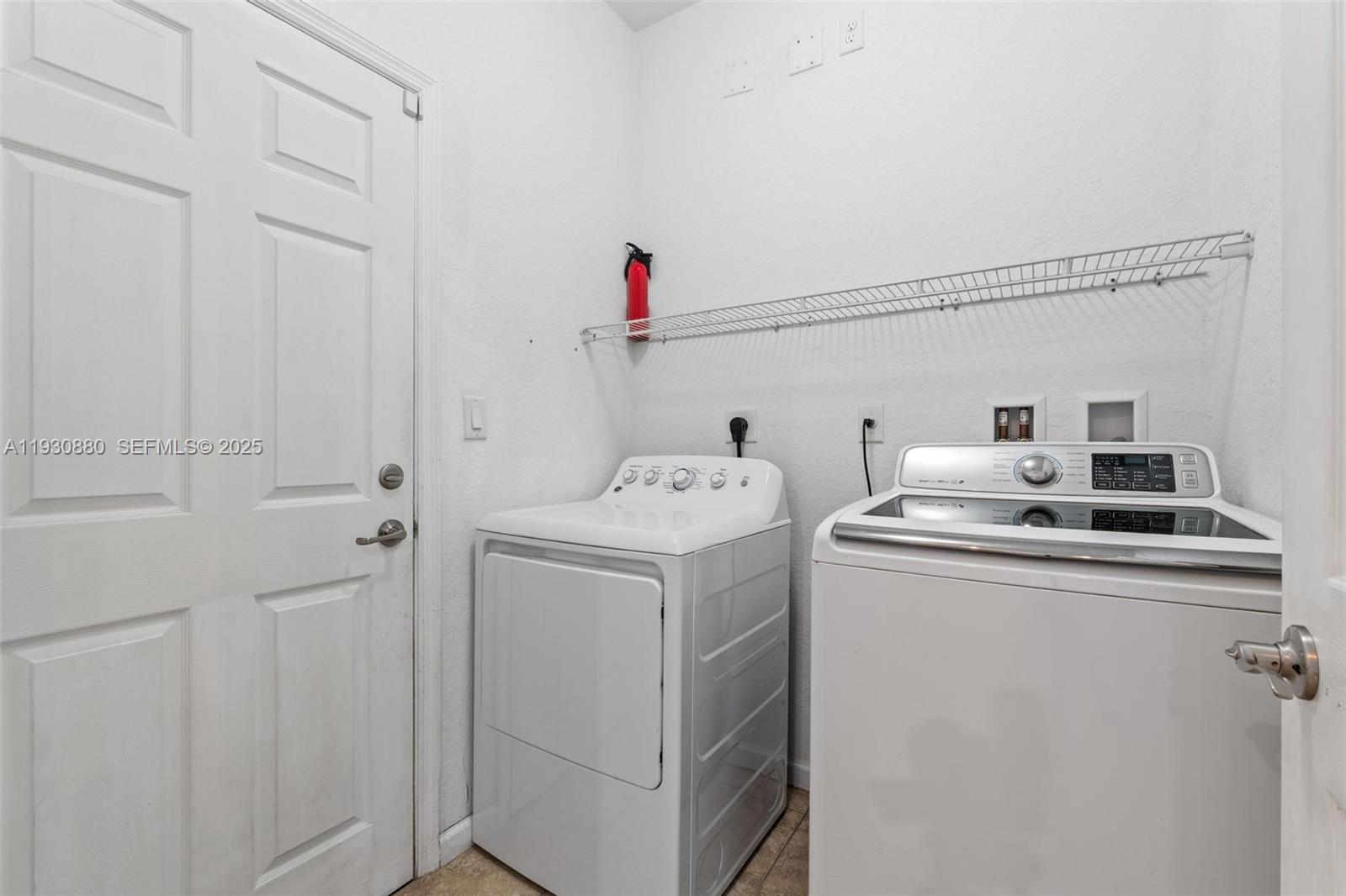 3448 Northeast 1st Street, Unit 3448 Homestead, FL 33033 - Photo 16 of 19 a utility room with dryer and washer