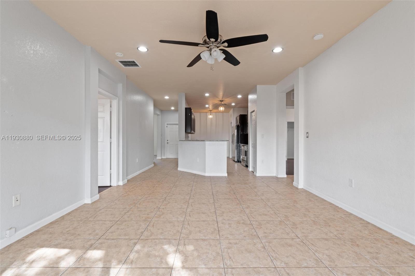 3448 Northeast 1st Street, Unit 3448 Homestead, FL 33033 - Photo 9 of 19 a view of a livingroom with a ceiling fan