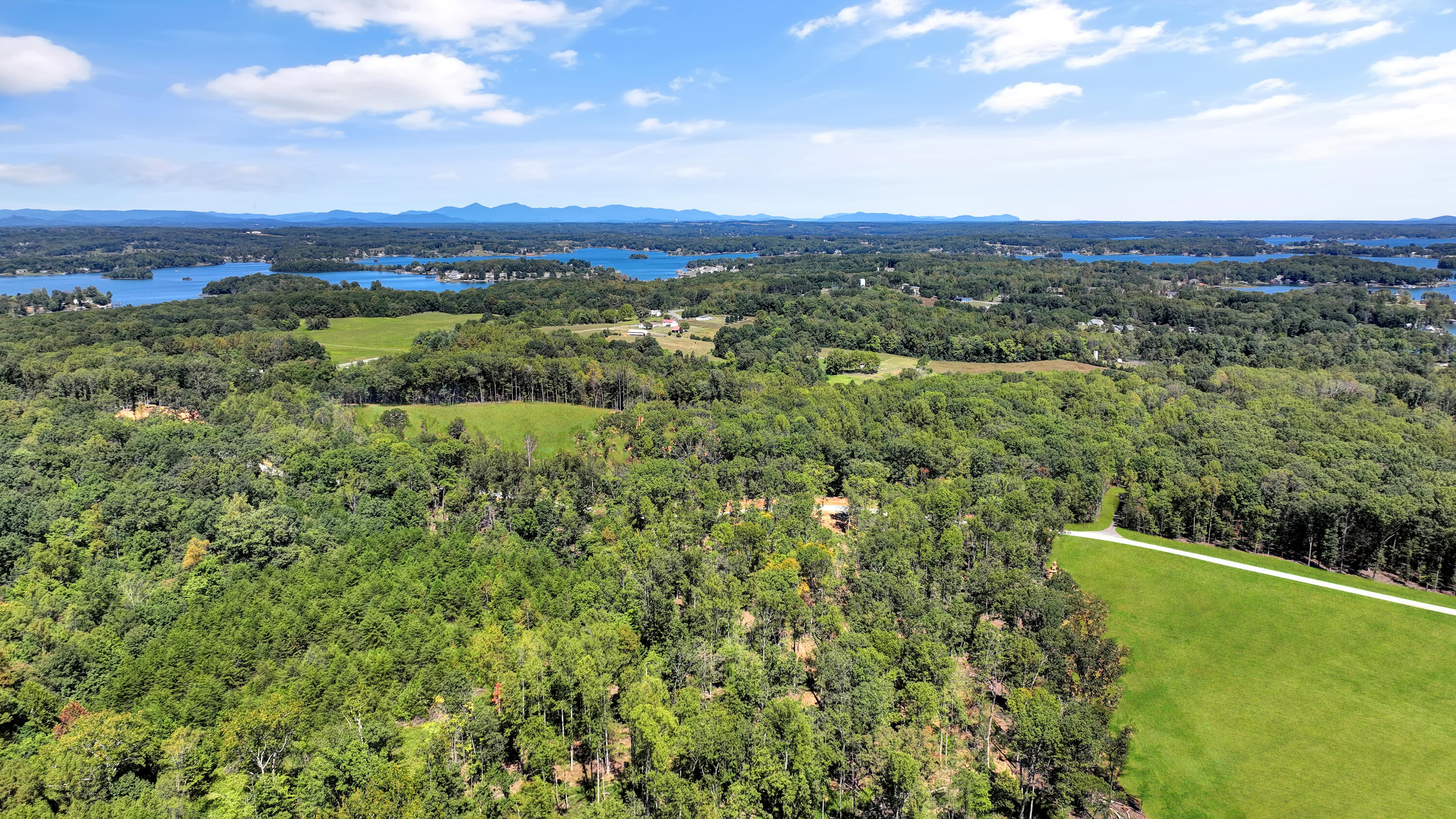 Lot 32 Hidden Treasures Lane Union Hall, VA 24176 - Photo 5 of 11 a view of a city with lush green forest