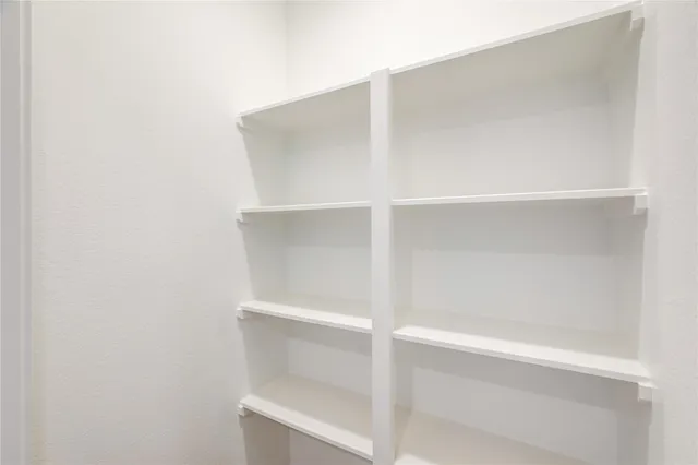 a view of a kitchen with a sink