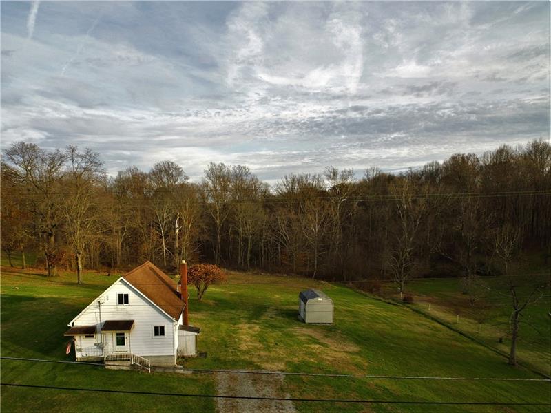 247 Van Meter Road Smithton, PA 15479 - Photo 1 of 16 Welcome to 247 Van Meter Road! With over an acre of level land, this house is perfectly situated to be your home sweet home!