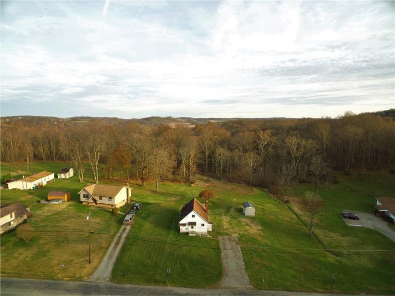 247 Van Meter Road Smithton, PA 15479 - Photo 4 of 16 Enjoy a country setting while still being minutes from the highway!
