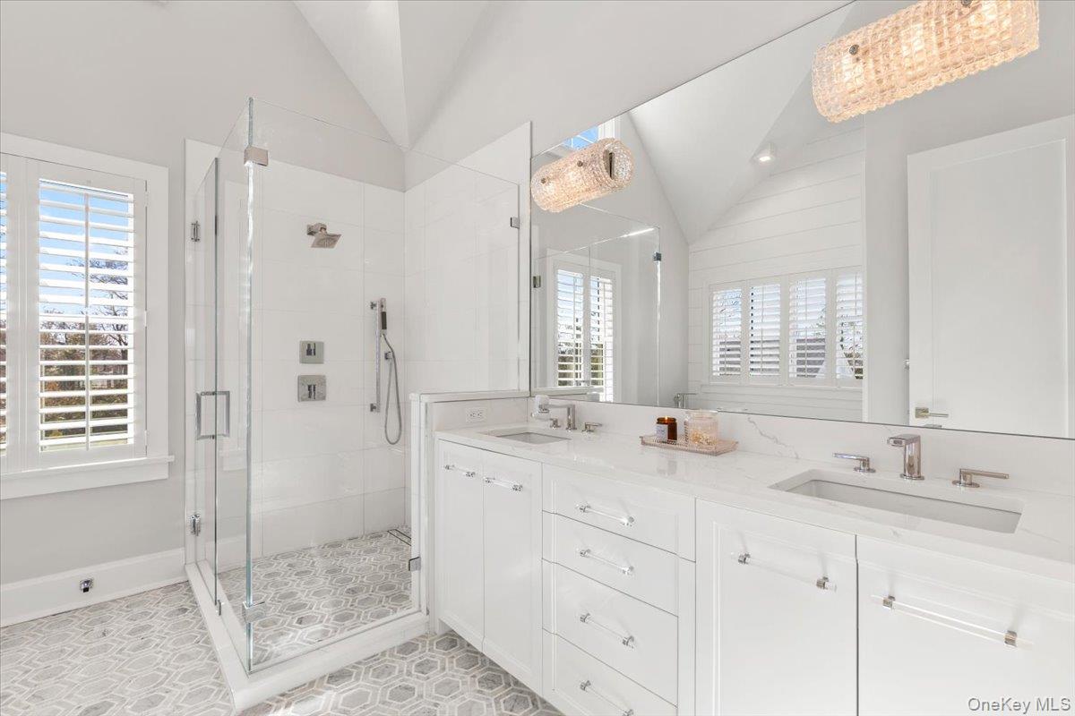 100 Dearborn Avenue Rye, NY 10580 - Photo 18 of 49 a bathroom with double sink and a mirror
