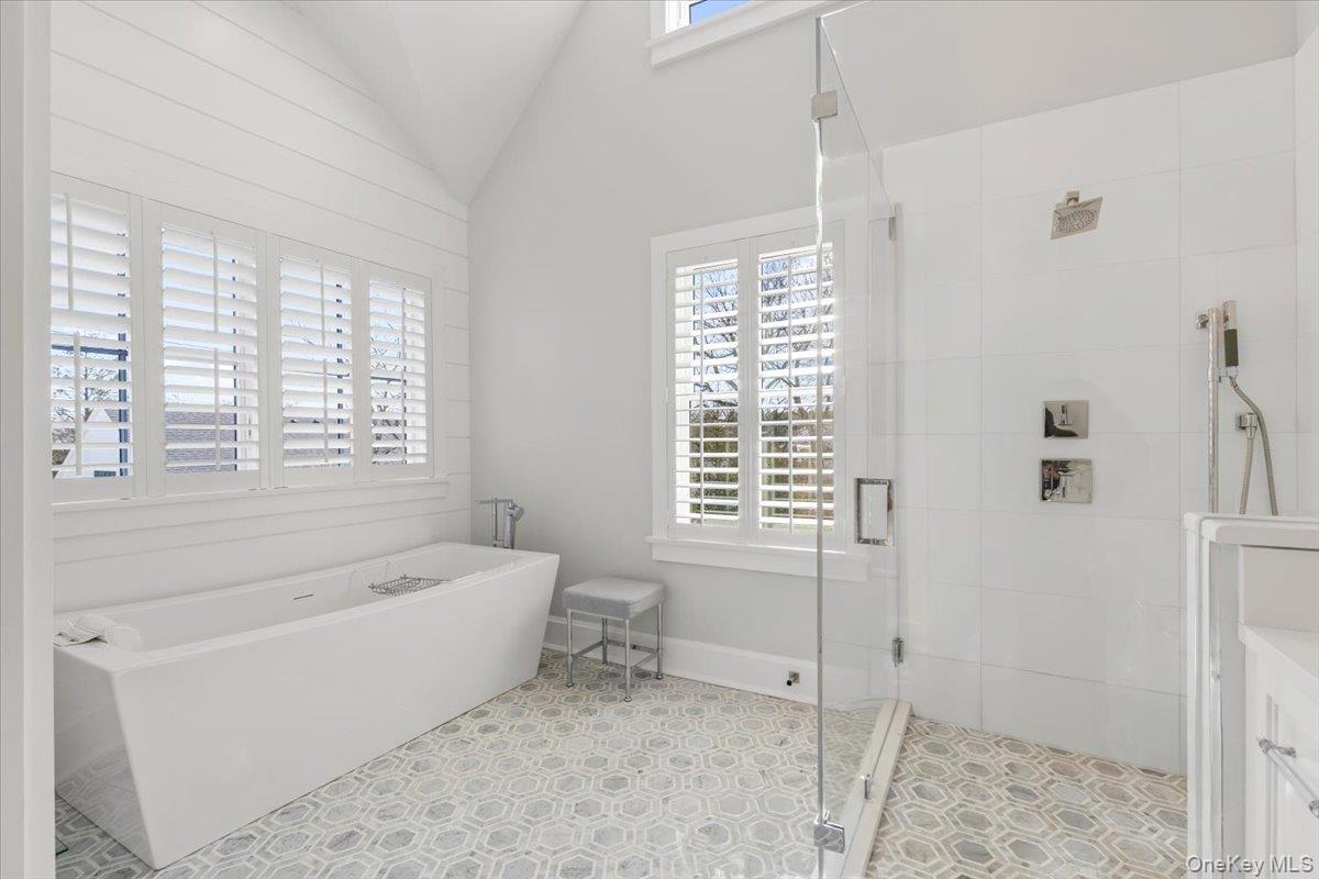 100 Dearborn Avenue Rye, NY 10580 - Photo 19 of 49 a bathroom with a bathtub and a shower