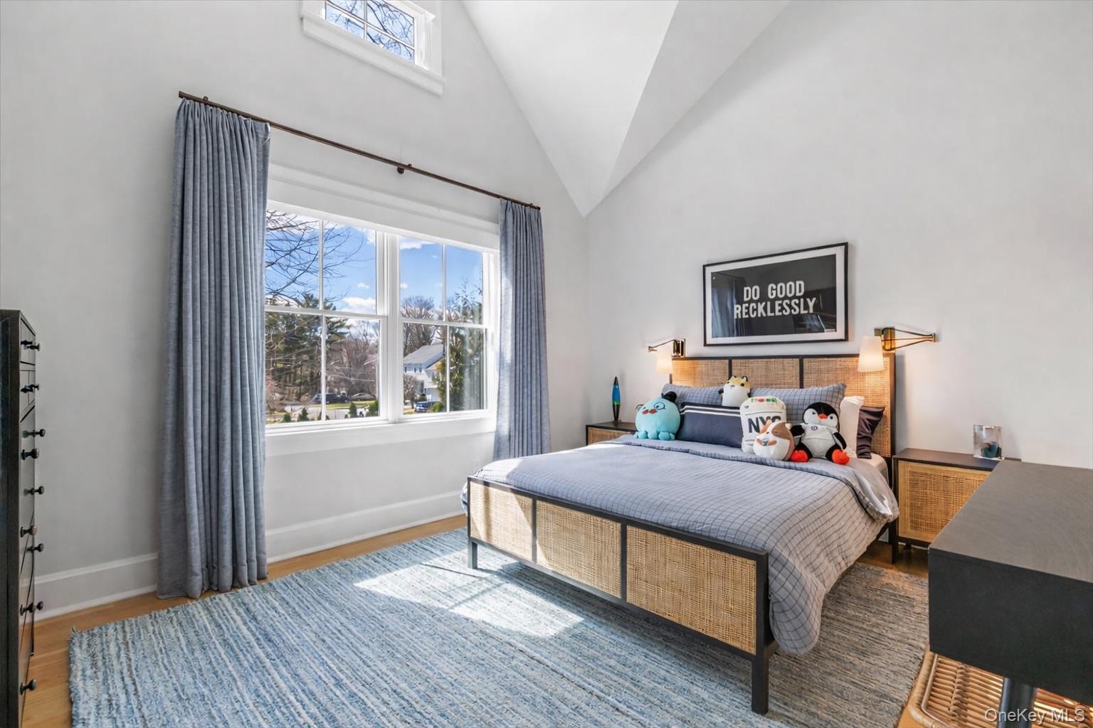 100 Dearborn Avenue Rye, NY 10580 - Photo 22 of 49 a bedroom with a bed and wooden floor