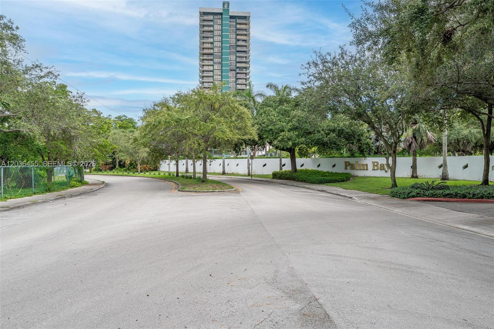 780 Northeast 69th Street, Unit 1010 Miami, FL 33138 - Photo 2 of 31 a view of street with a building in the background
