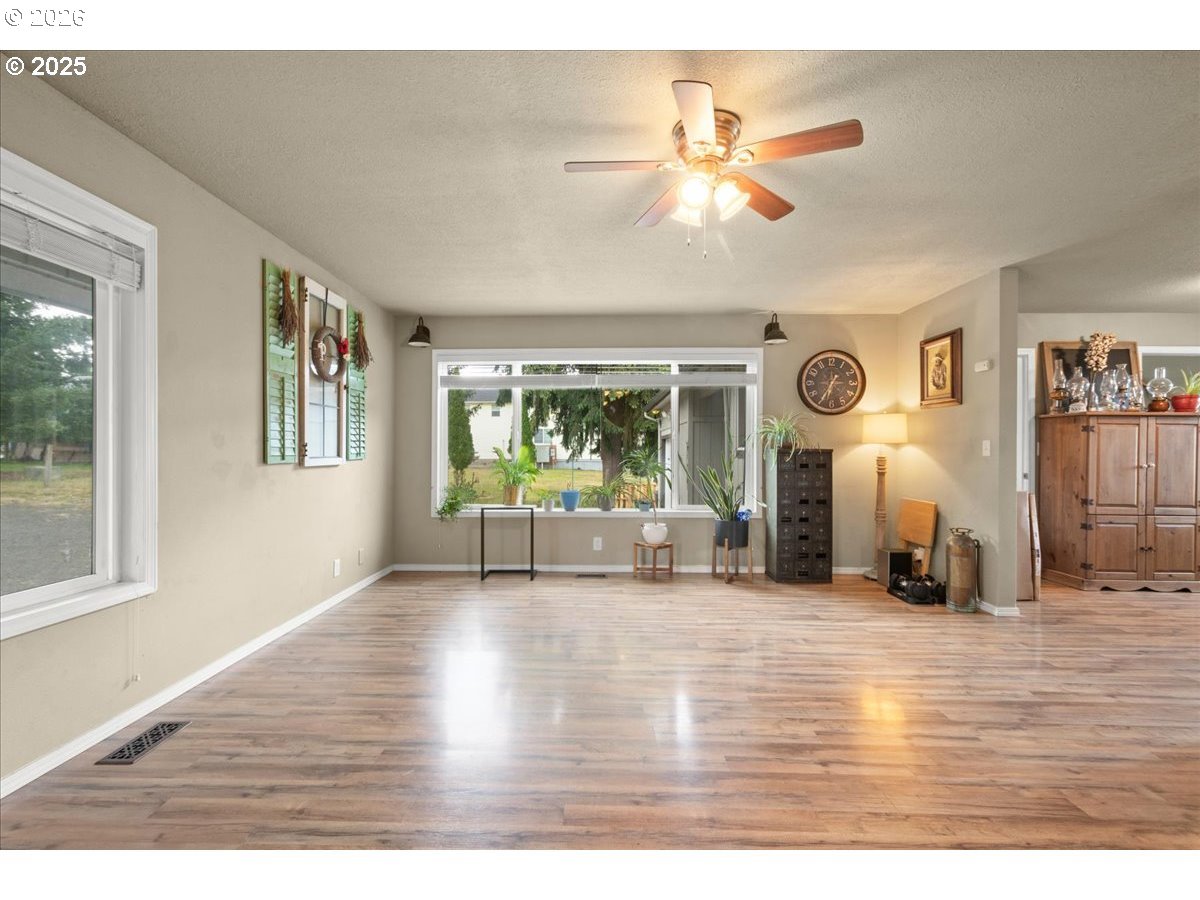 1415 Sightly Road Toutle, WA 98649 - Photo 16 of 36 a view of livingroom with furniture wooden floor and window