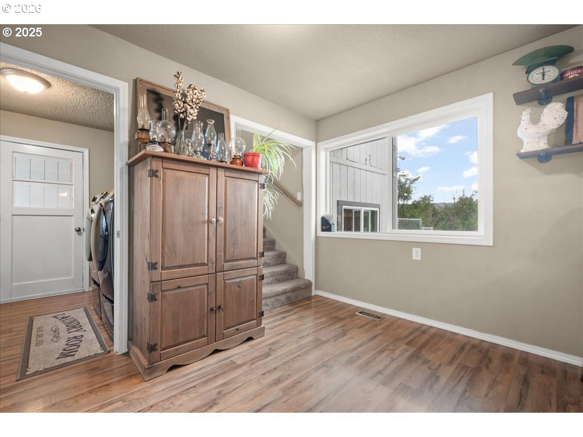 1415 Sightly Road Toutle, WA 98649 - Photo 18 of 36 a view of a hardwood floor and wardrobe